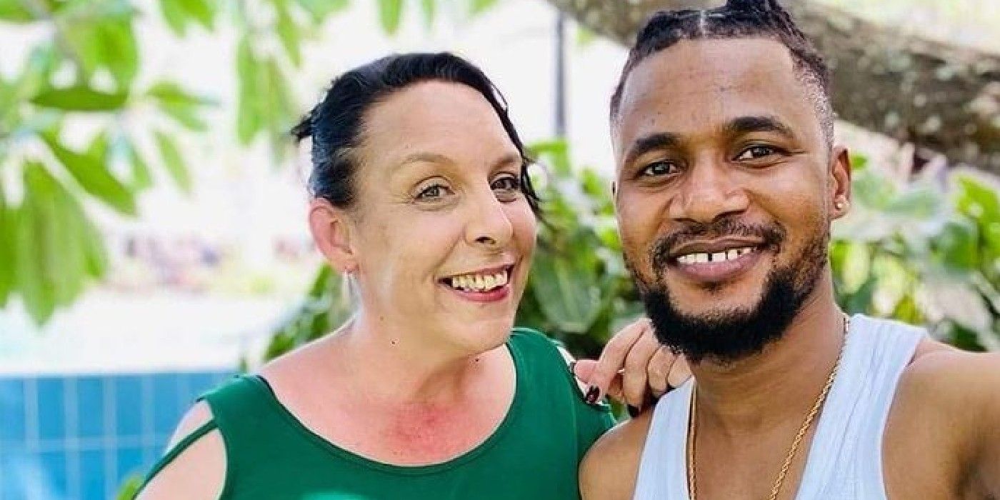 Kim Menzies in green dress posing for selfie with Usman Sojaboy Umar in white tank top for90 Day Fiance Before the 90 Days Season 5