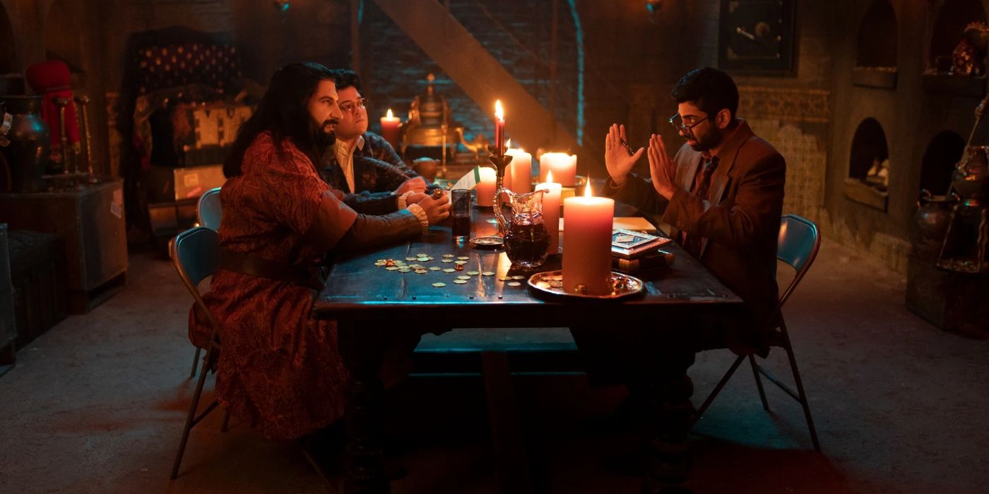 Nandor and Guillermo sitting with the Djinn in What We Do in the Shadows