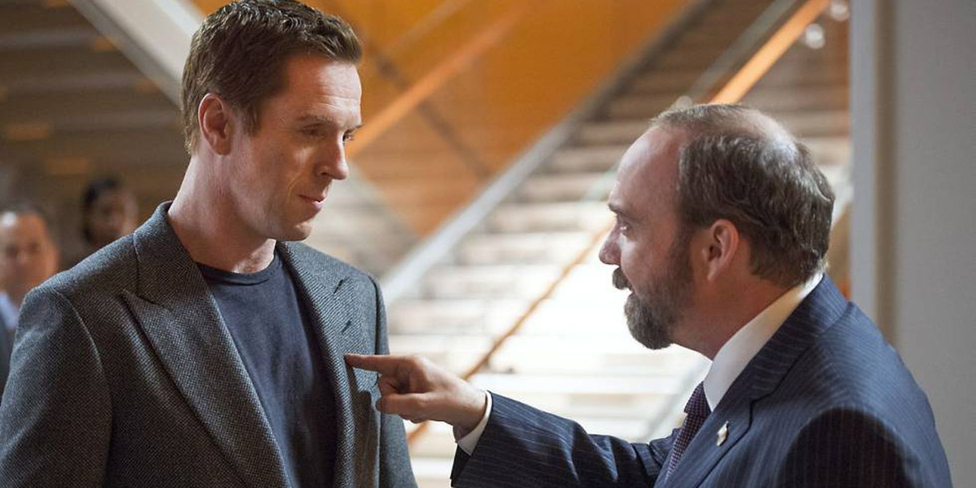 Paul Giamatti points a finger at Damian in Billions 