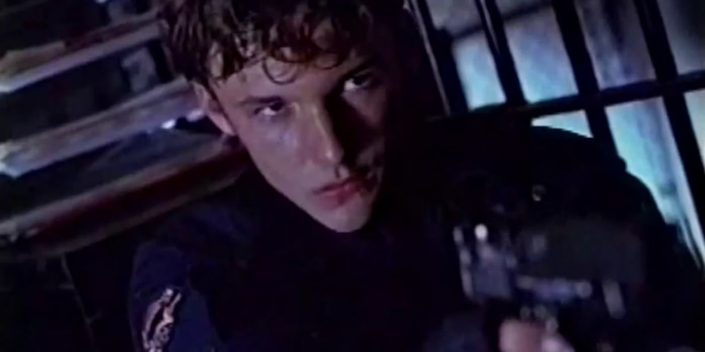 Brad Renfro as a Leon aiming his gun in an RE2 commercial.