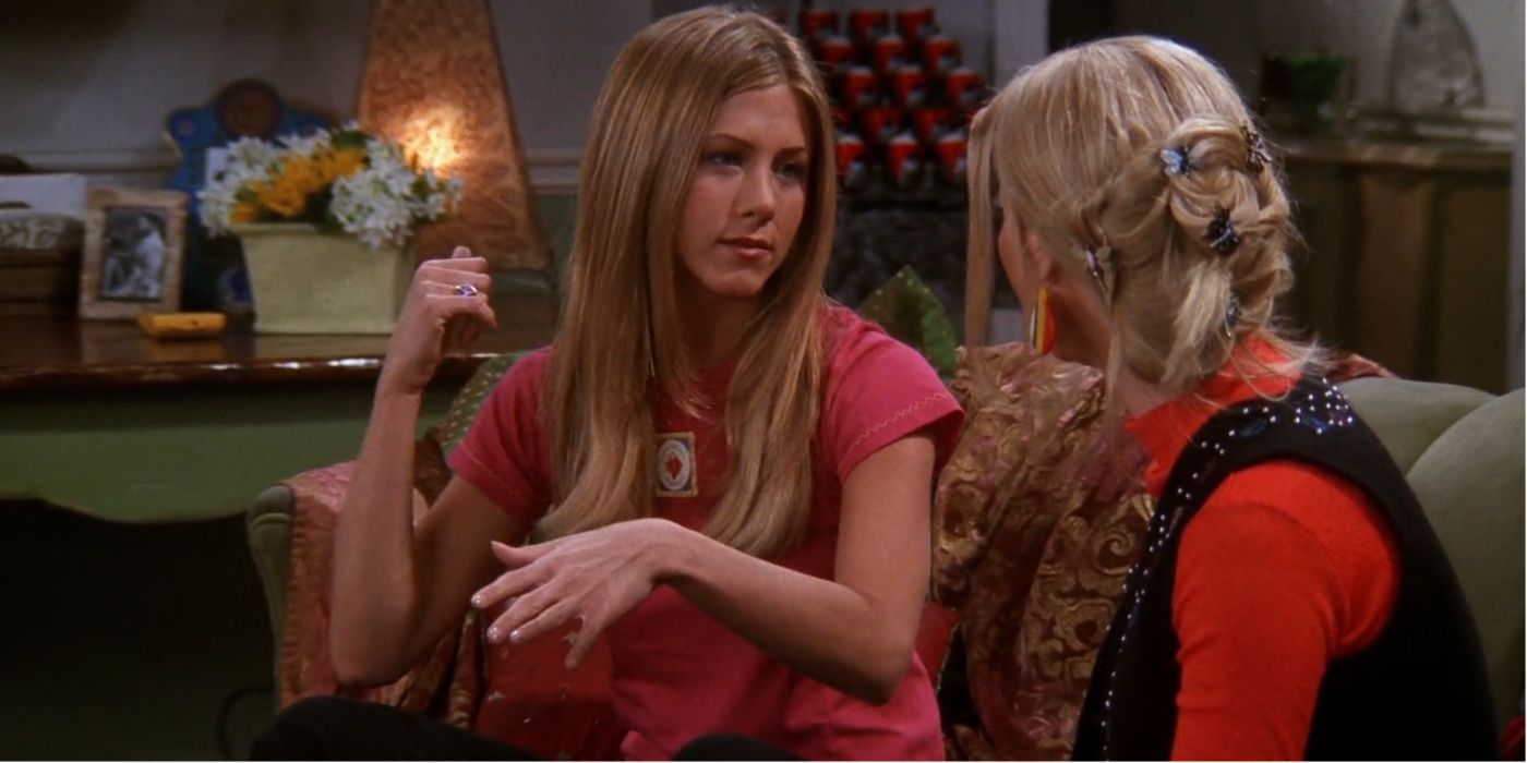 Rachel Green and Phoebe Buffay sitting on a couch in Friends