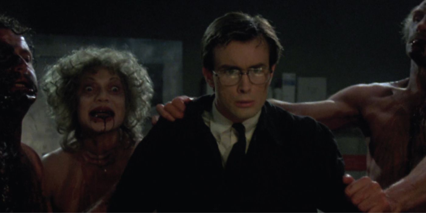 Herbert West surrounded by the undead in Re-Animator