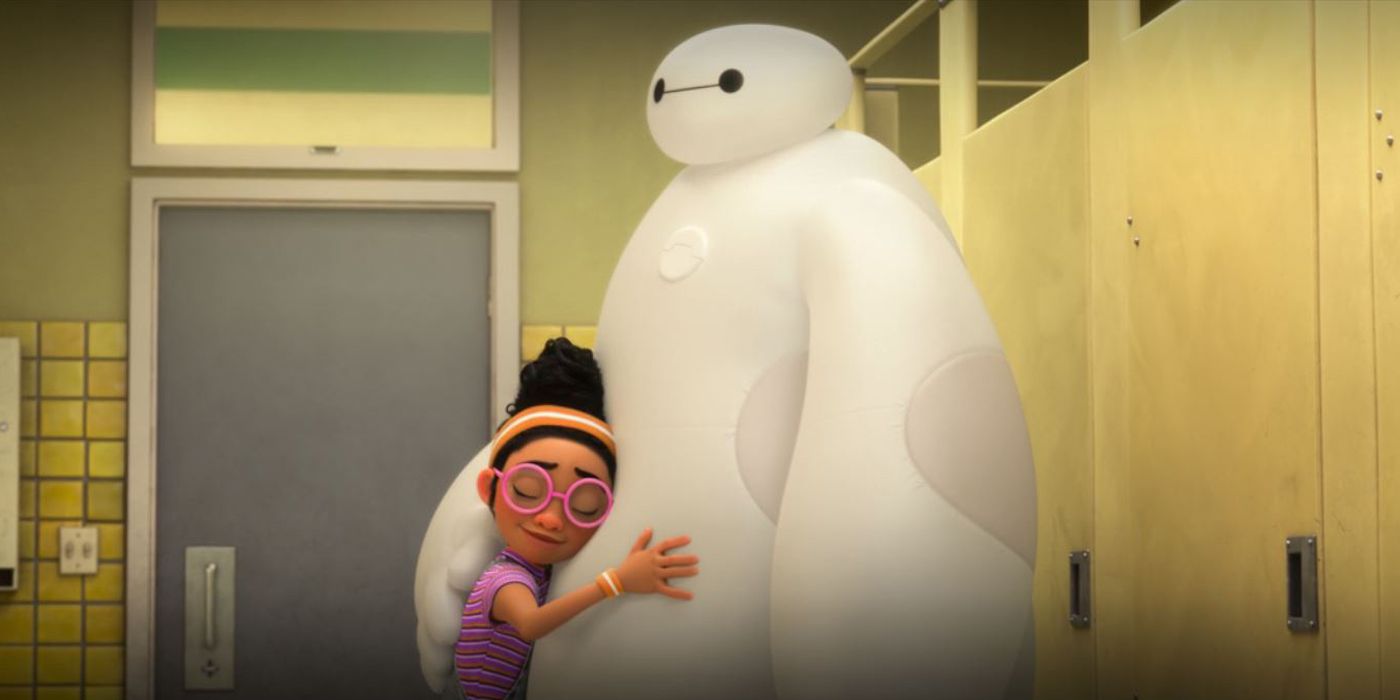 Sofia hugging Baymax.