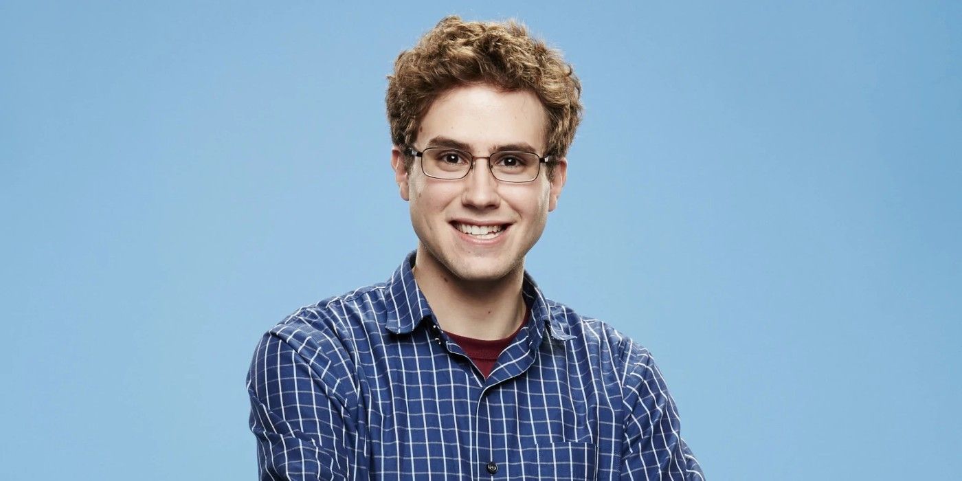 Steve Moses smiling for a portrait for Big Brother