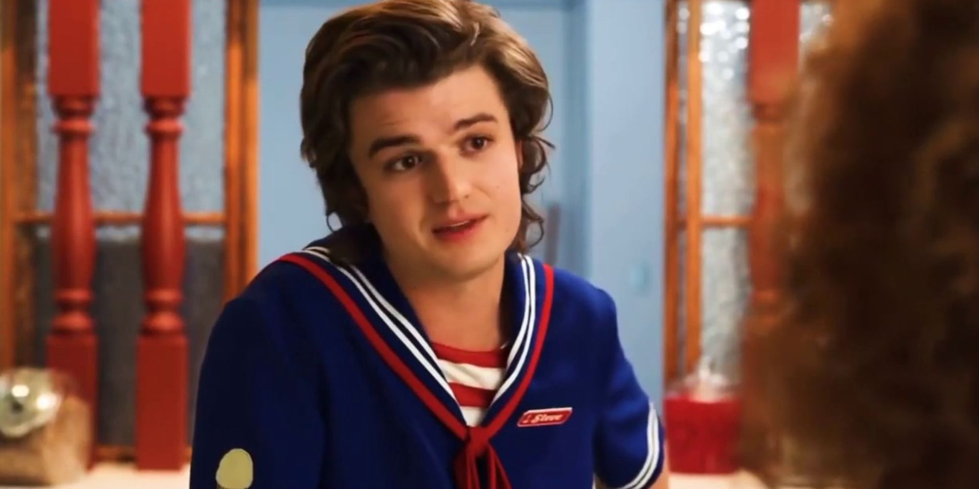 Steve introduces himself to a group of women while wrking at Scoops Ahoy in Stranger Things