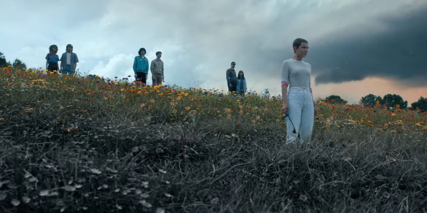 The kids look out over a field in Stranger Things 