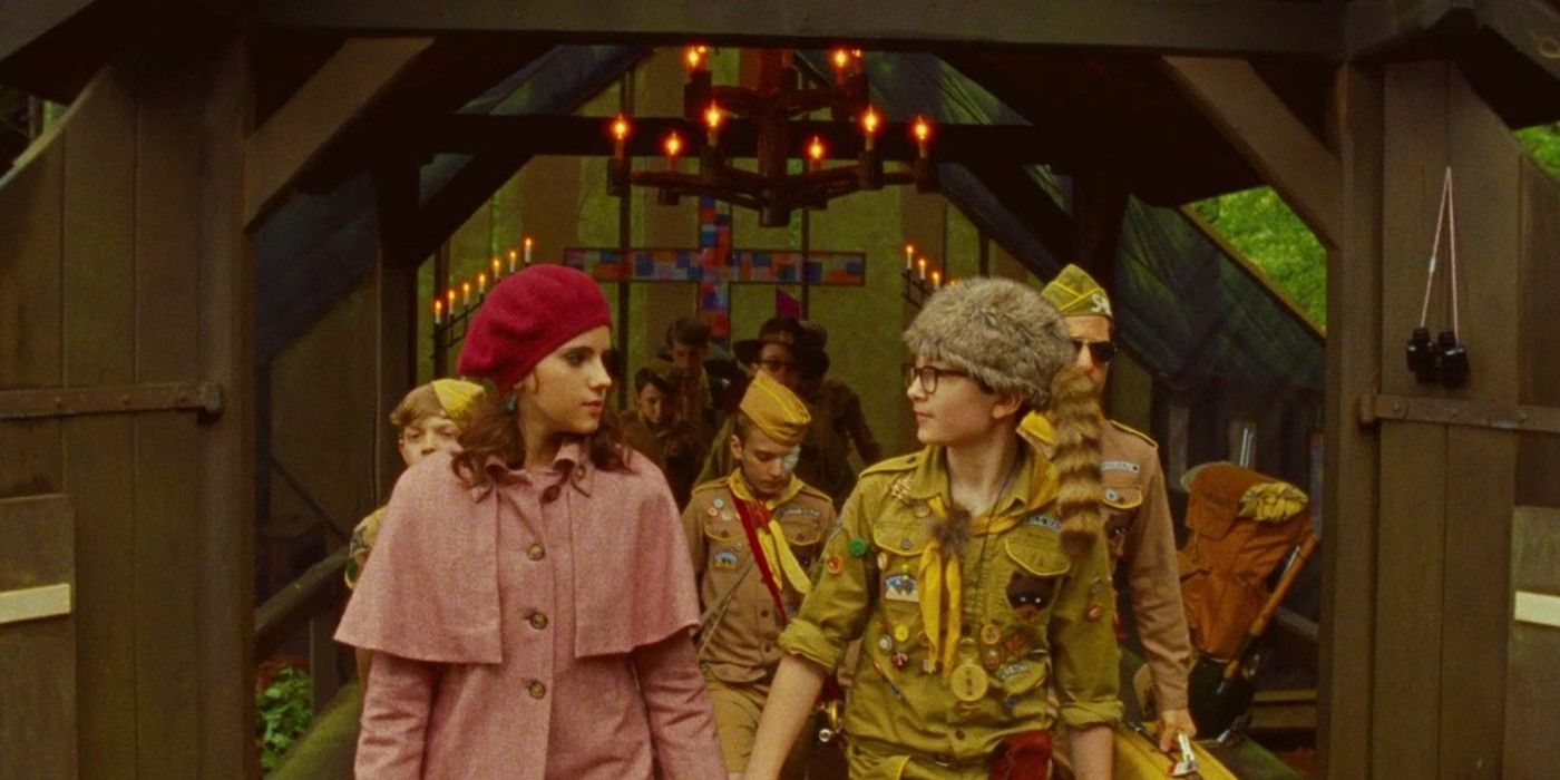 Suzy and Sam hold hands in Moonrise Kingdom