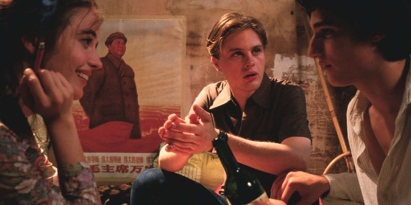 The trio talking in The Dreamers