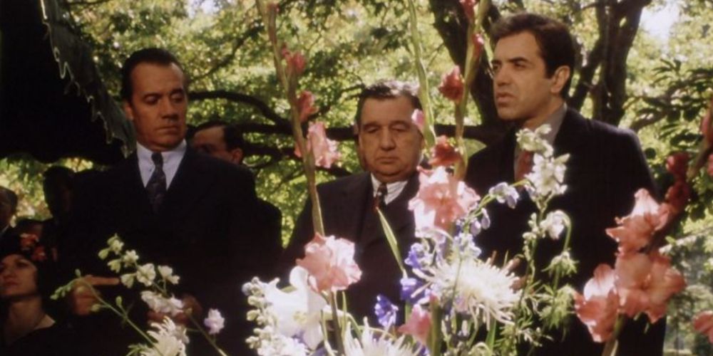 Tony Sirico's character Rocco attends a funeral in Bullets Over Boradway