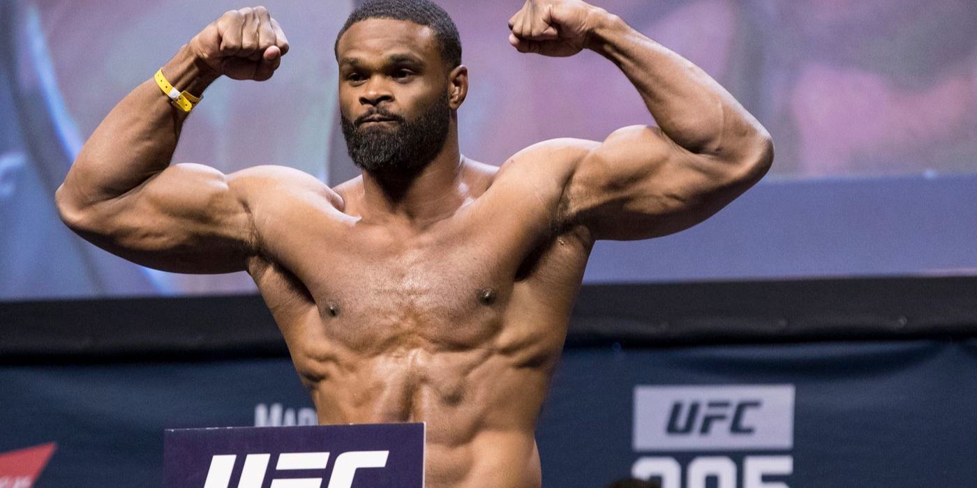 Tyron Woodley flexing his biceps.