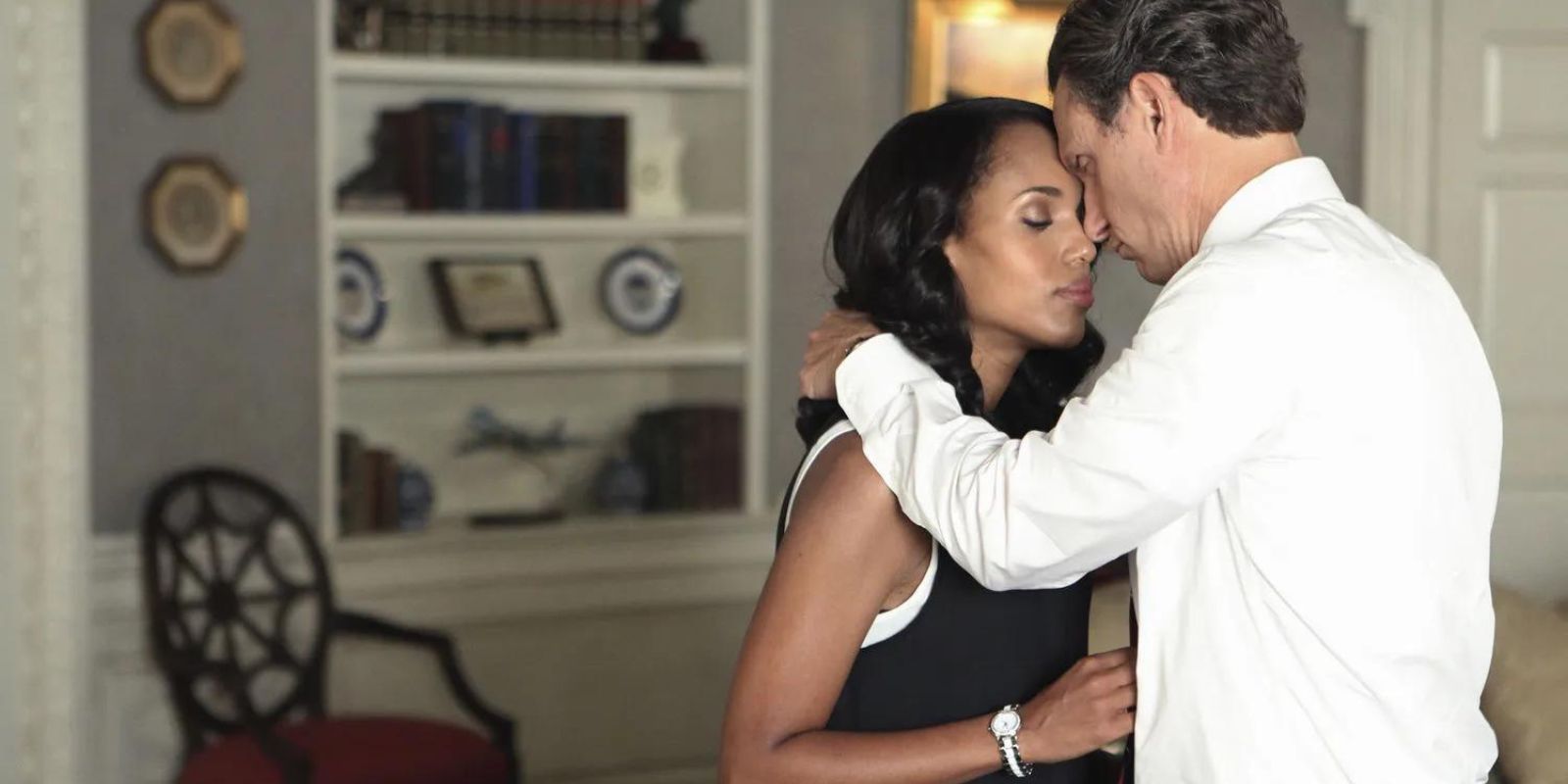 Fitz and Olivia begin to hug one another