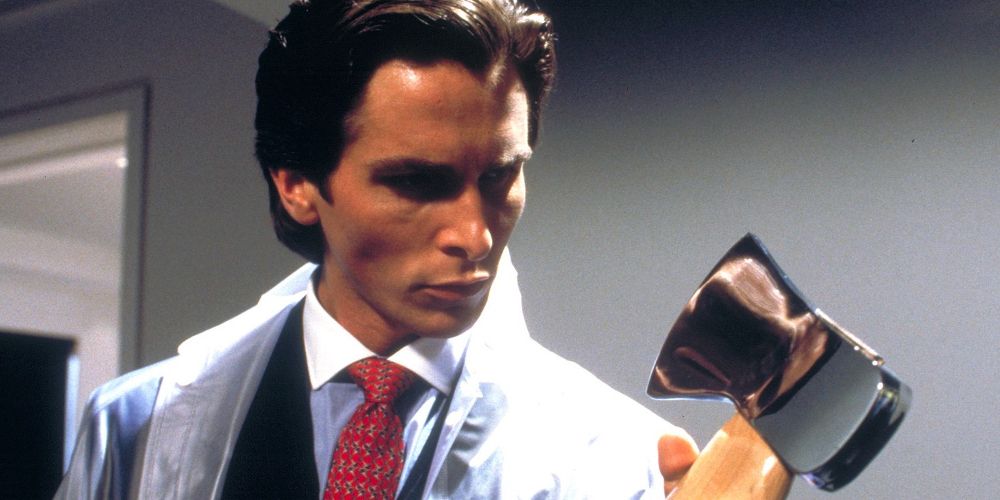 Patrick sees his reflection in an ax blade in American Psycho