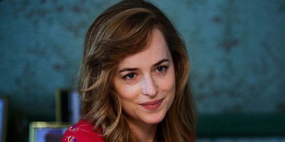 Lindsey smiles at the dinner table in Black Mass