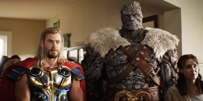 chris hemsworth as thor and taika waititi as korg in thor love and thunder 2022