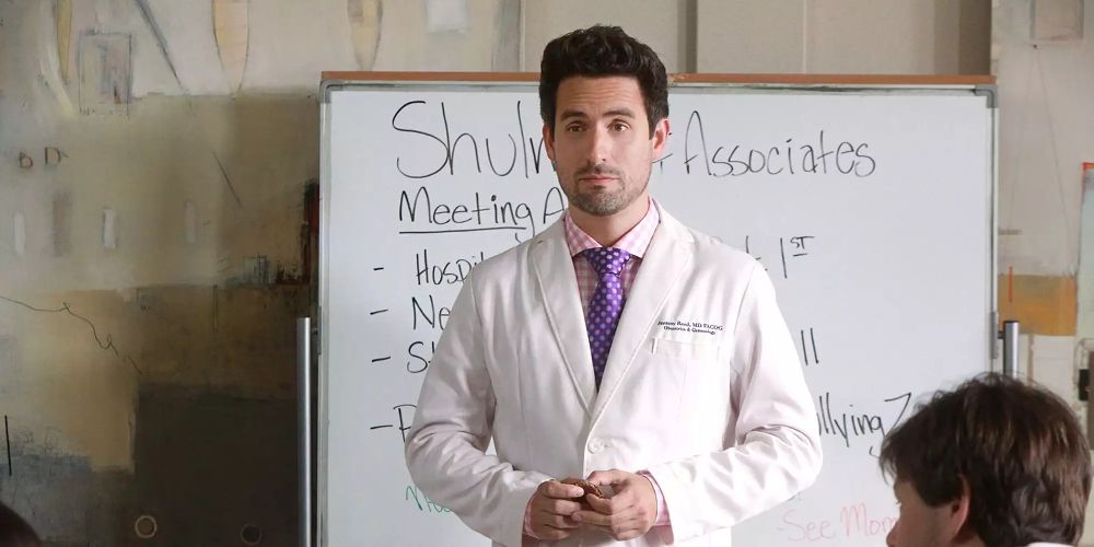 Dr. Reed stands at a whiteboard in The Mindy Project
