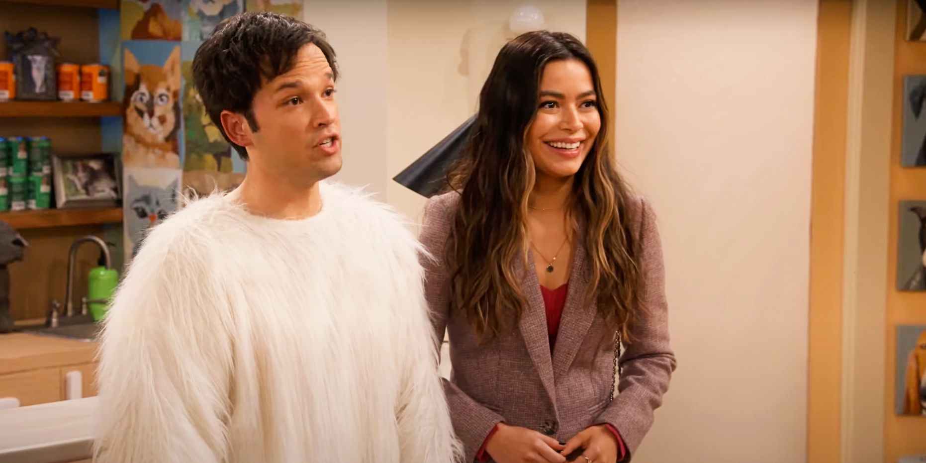 Miranda Cosgrove and Nathan Kress as Carly and Freddie standing together in the iCarly revival