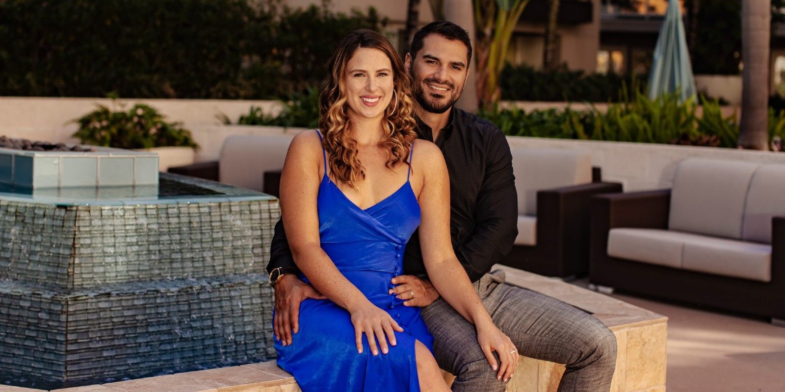Miguel holding Lindy and Lindy in a blue dress from Married at First Sight season 15 smiling
