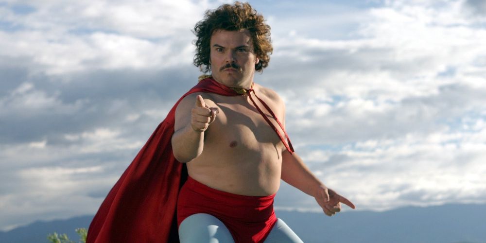 Nacho points a finger by the sea in Nacho Libre