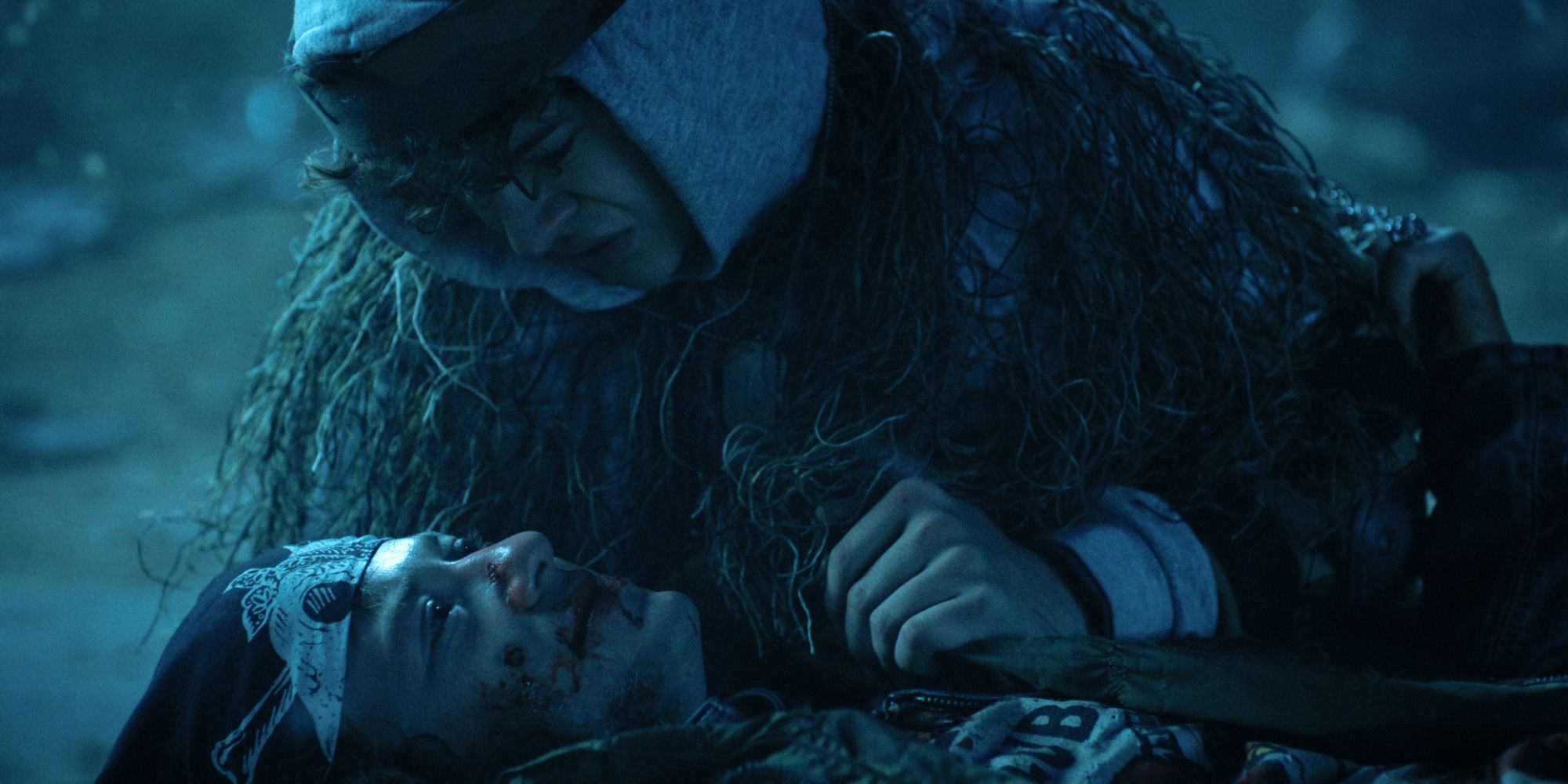 Dustin holds Eddie as he dies in Stranger Things season 4