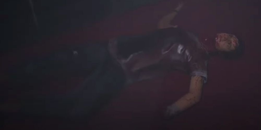Dylan lies dead in the kitchen in The Quarry