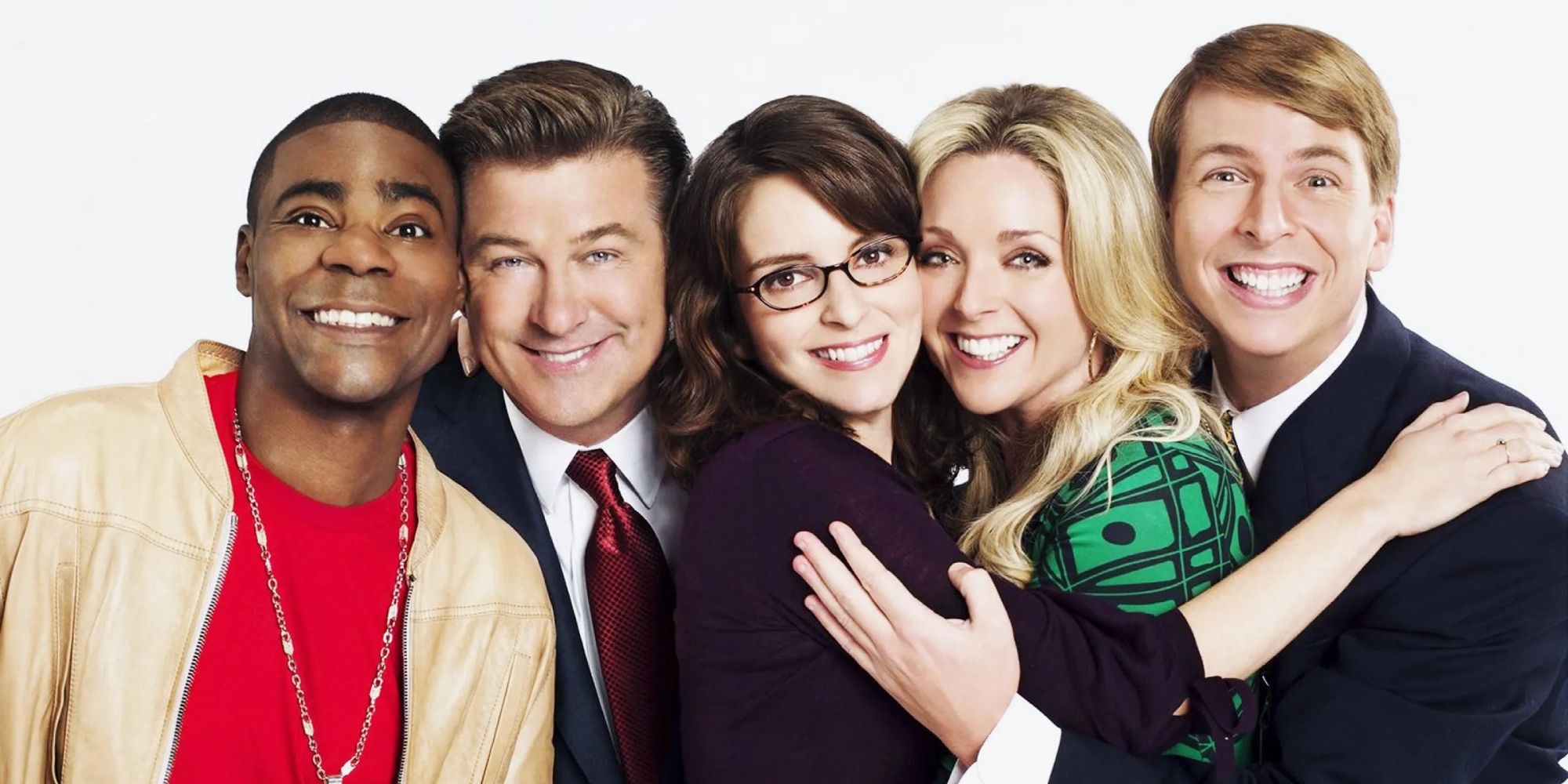 The cast of 30 Rock embracing in a promotional image for the show.