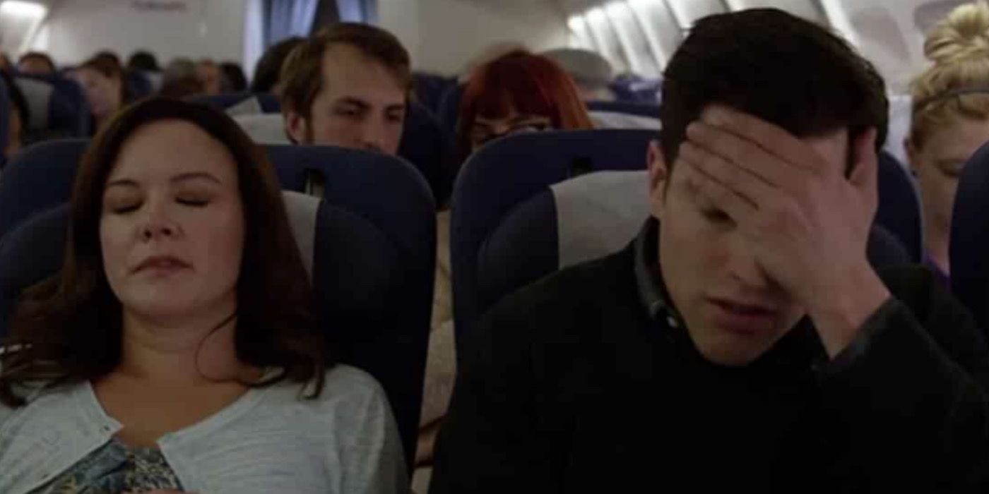 Schmidt sits on a plane while his wedding reception goes on without him in New Girl