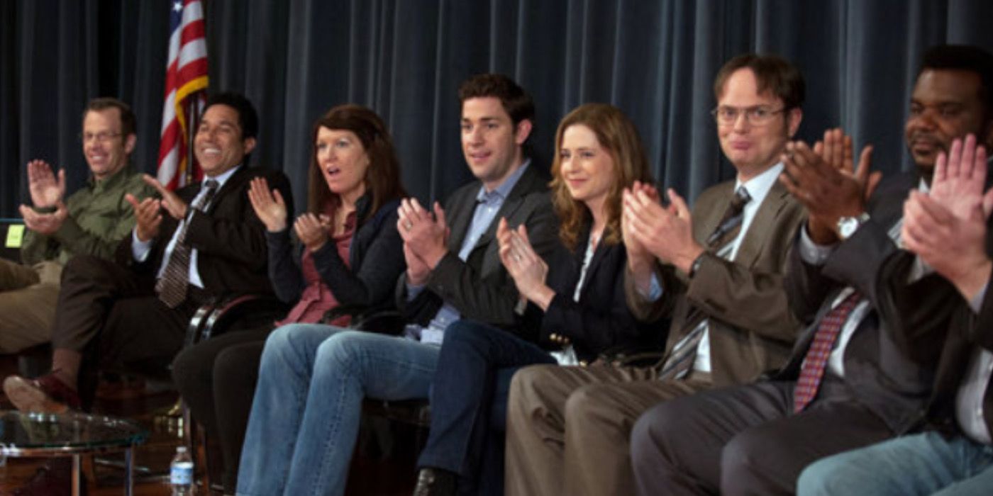 The Office cast claps at their discussion panel for the documentary 