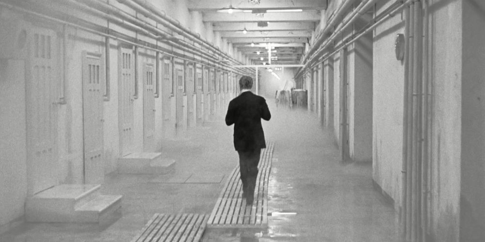 A man walks down a strange hallway from 8 1/2
