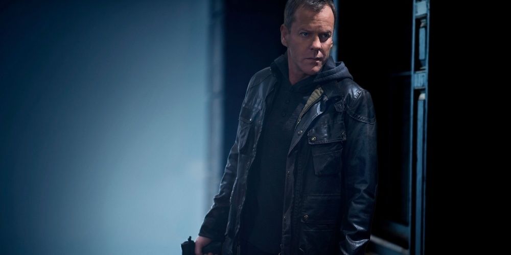 A man holds a gun in 24