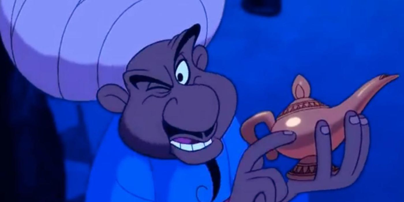 Un comerciante callejero sosteniendo la lámpara en la escena inicial de Aladino.