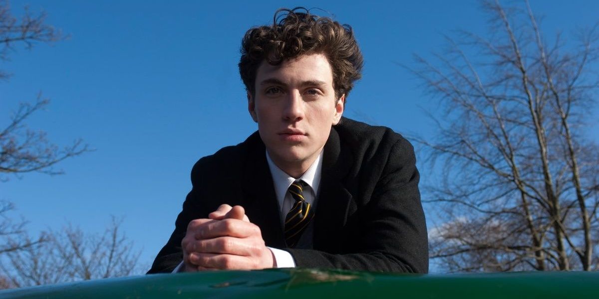 Aaron Taylor Johnson poses for a photo in Nowhere Boy Cropped