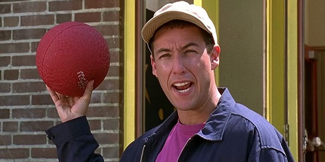 Adam Sandler holding a dodgeball in Billy Madison