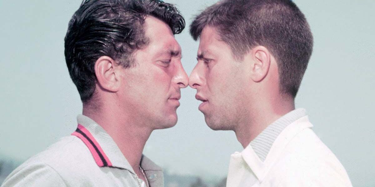 An image of Dean Martin and Jerry Lewis looking at each other in a serious manner