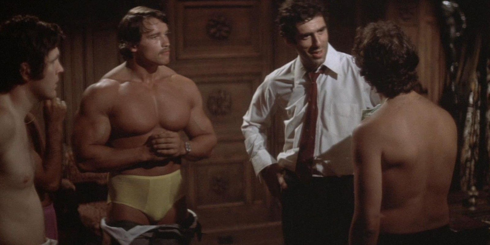 Arnold Schwarzenegger shirtless next to Elliot Gould in The Long Goodbye