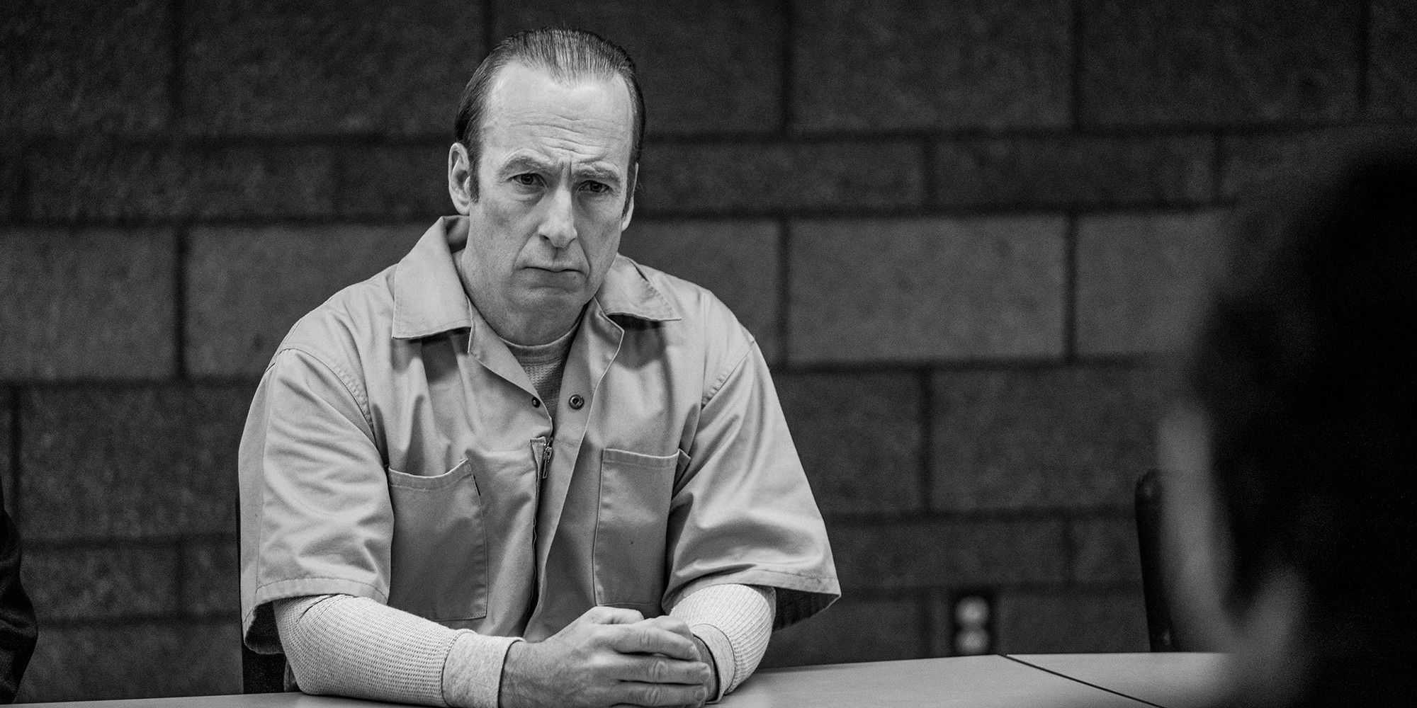 Bob Odenkirk as Jimmy McGill in prison attire in Better Call Saul