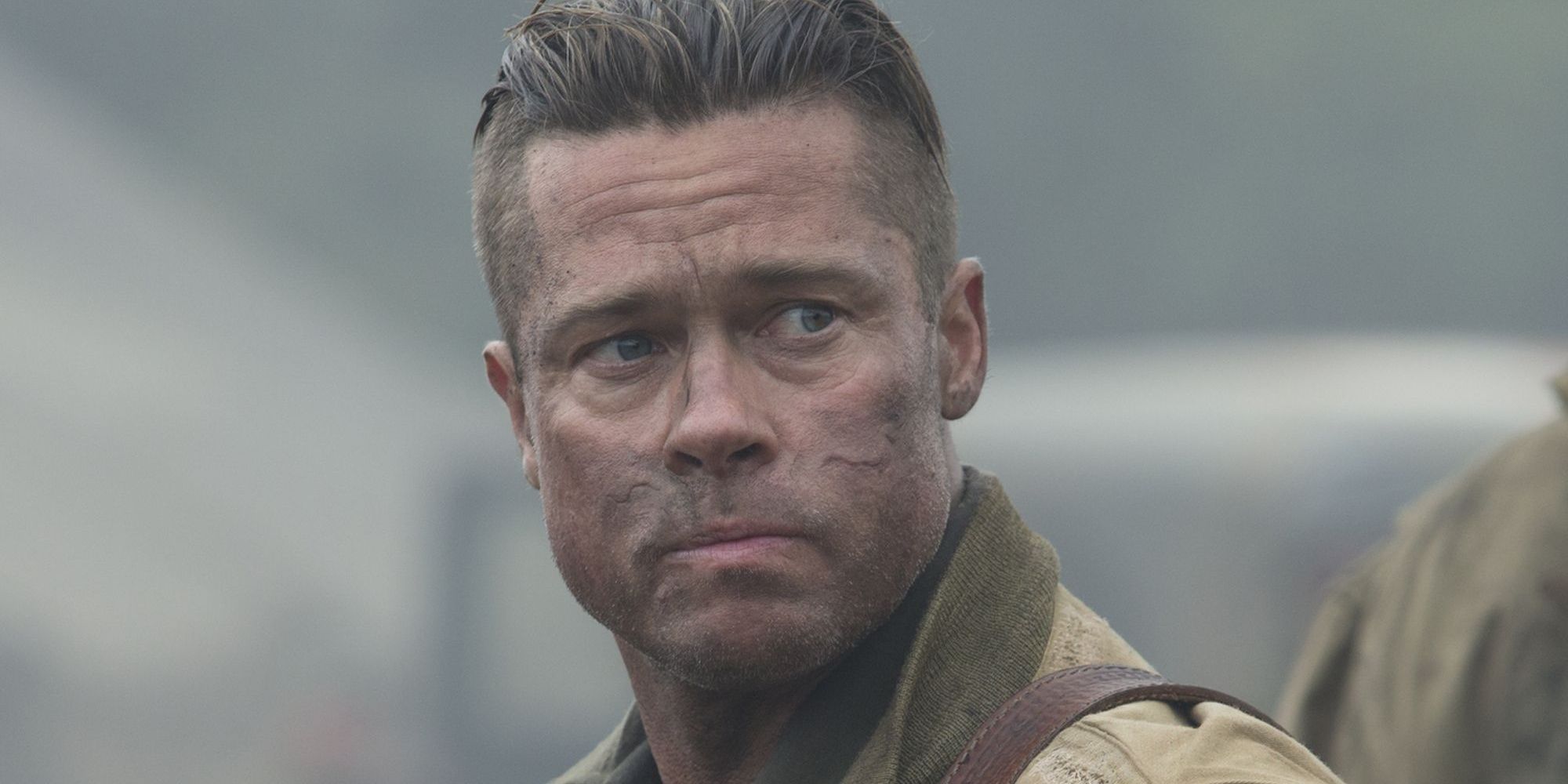Brad Pitt looking to his left in Fury 