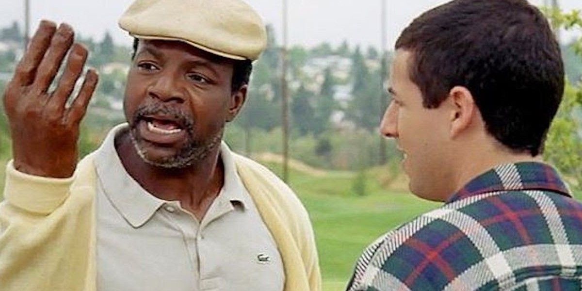 Carl Weather holding up his wooden hand in Happy Gilmore