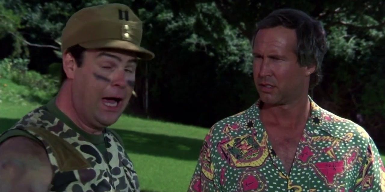Chevy Chase and Dan Aykroyd on a golf course in Caddyshack II