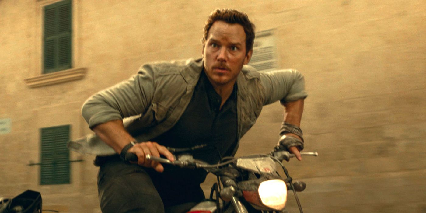 Chris Pratt riding a motorcylce as Owen in Jurassic World Dominion