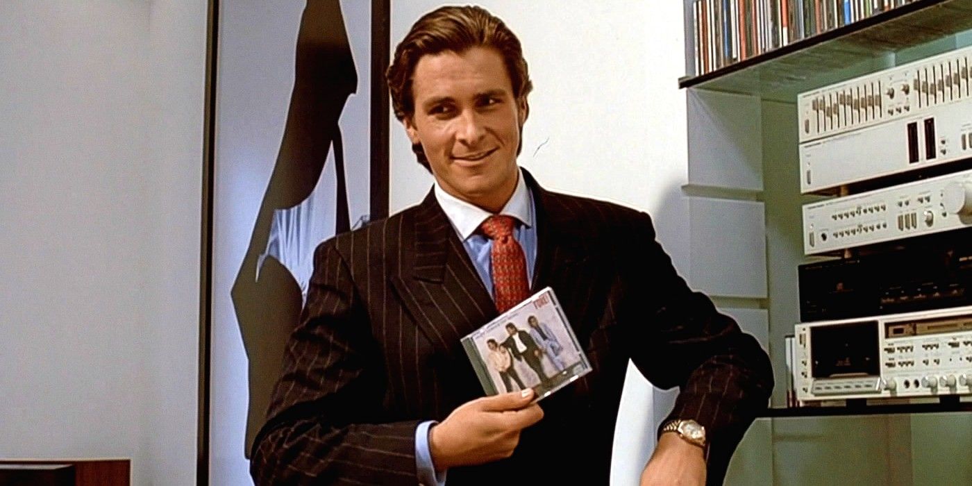 Christian Bale as Patrick Bateman in American Psycho holding Huey Lewis and the News CD
