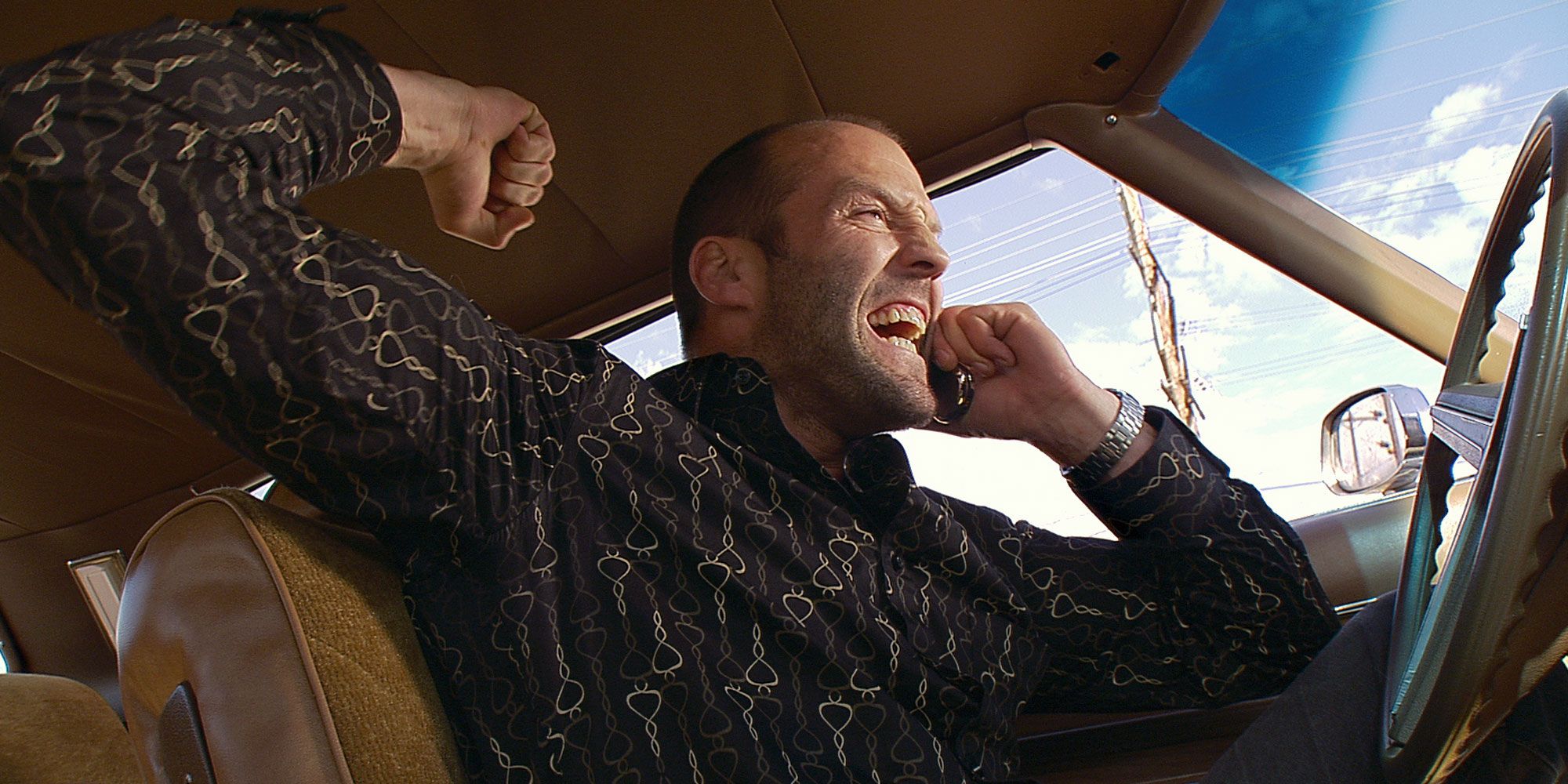 Jason Statham screaming in a car in Crank (2006)