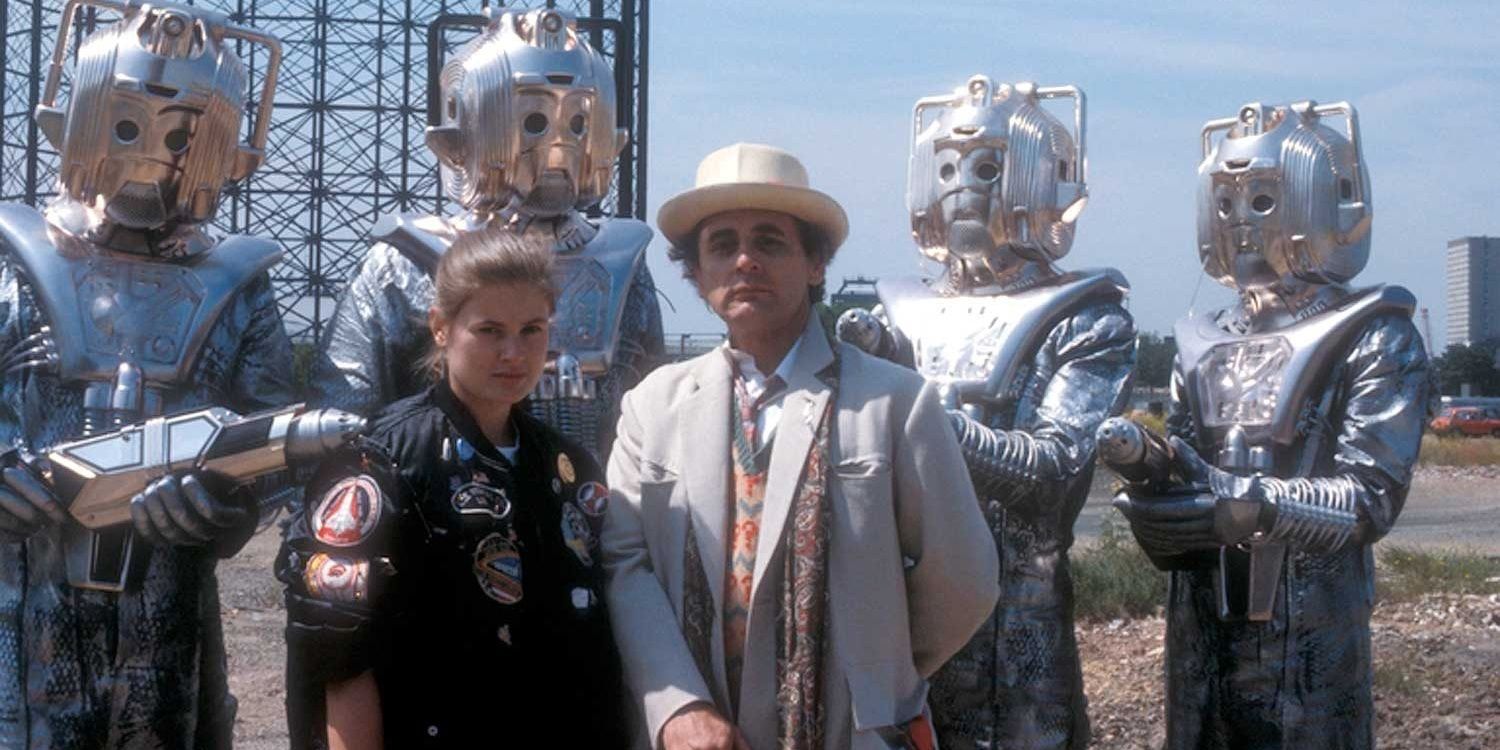 The Cybermen surrounding the Seventh Doctor and Ace in the Doctor Who serial "Silver Nemesis."