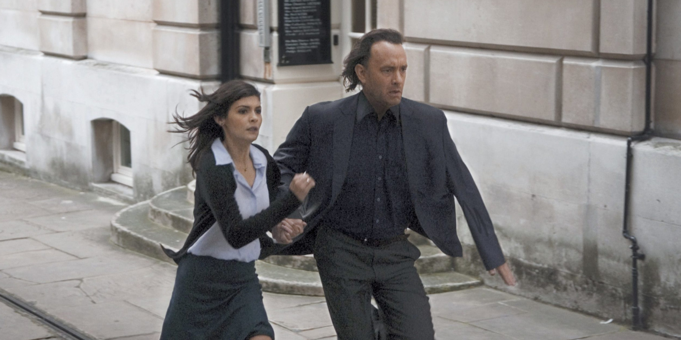 Tom Hanks and Audrey Tautou running down the street in the Da Vinci Code