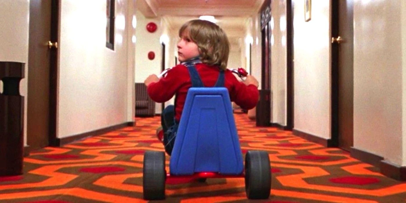 Danny rides his tricycle through the Overlook The Shining 1980