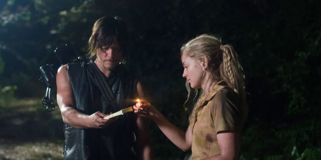 Daryl and Beth torch a book in The Walking Dead 