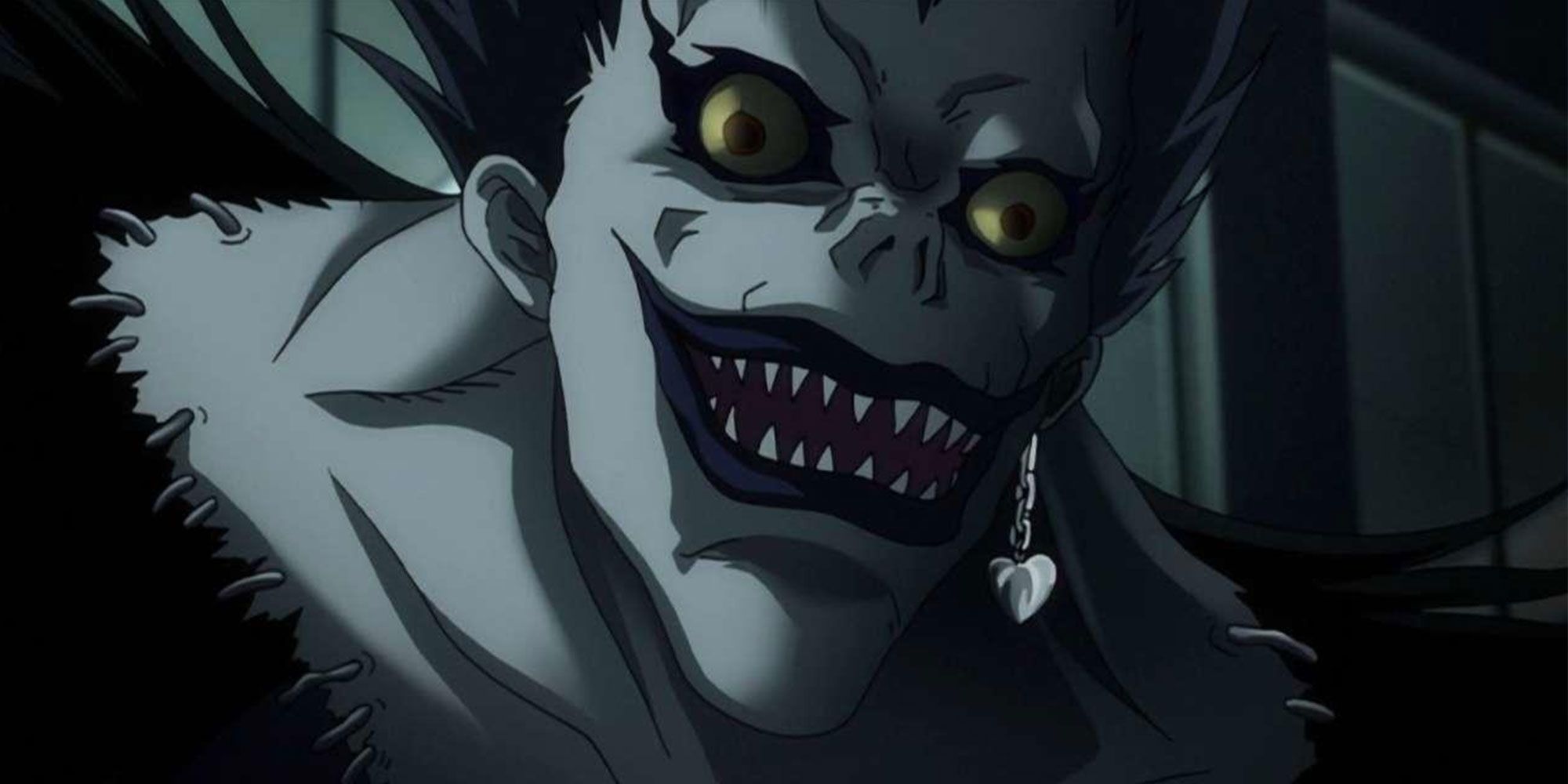Ryuk smiling in the Death Note anime.