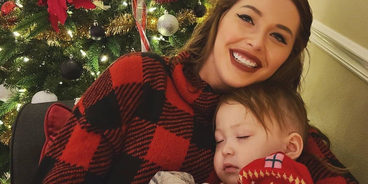 90 Day Fiance star Deavan Clegg with son Taeyang in front of Christmas tree