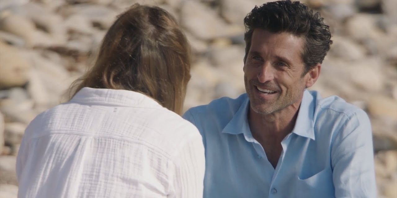 Derek talking to Meredith at the beach in Grey's Anatomy 
