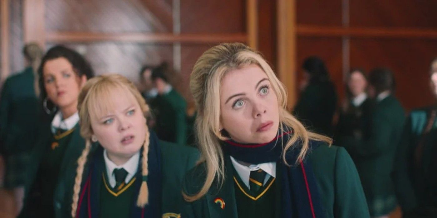 Erin, Clare, and Michelle react to something in Derry Girls