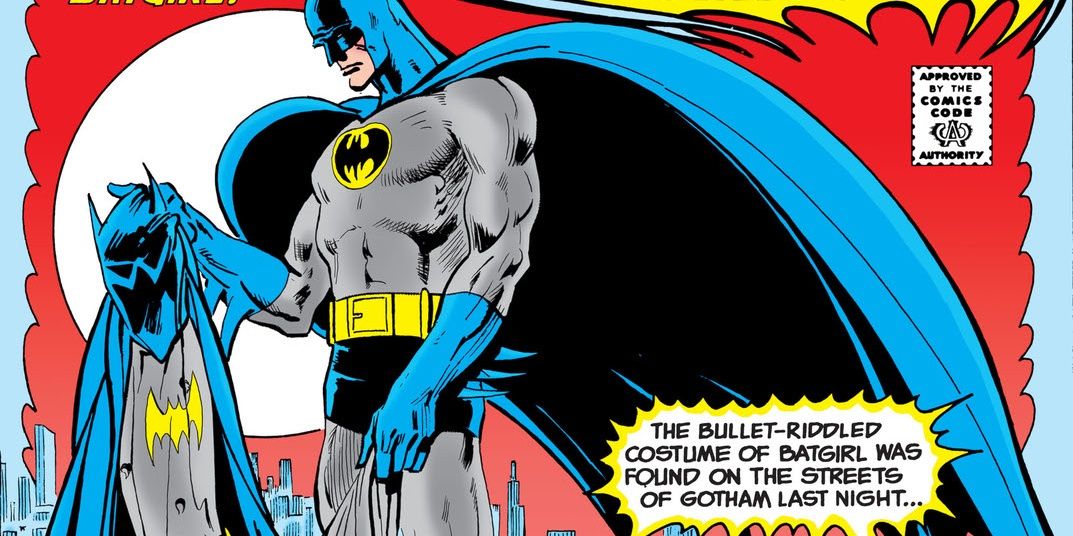 Batman holds Batgilr&rsquo;s bullet-riddled costume in Detective COmics